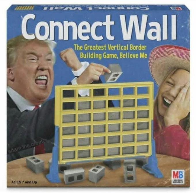 Дети играют в Connect Four Дети играют в Connect Four