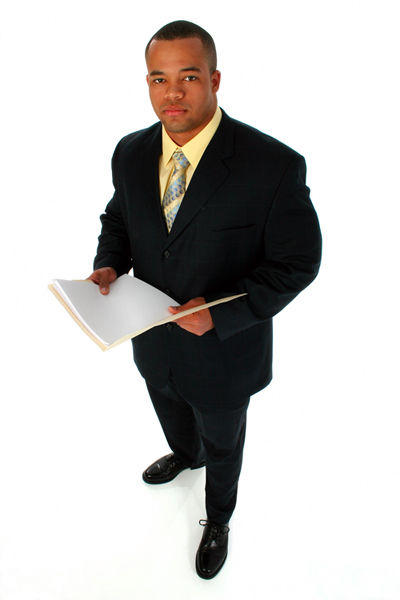 Handsome African American business man dressed in a black suit