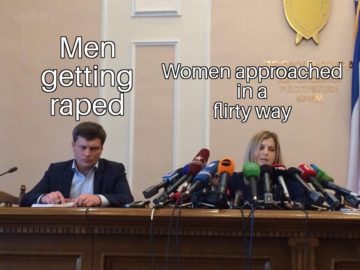 Поклонская с микрофонами и грустный мужик